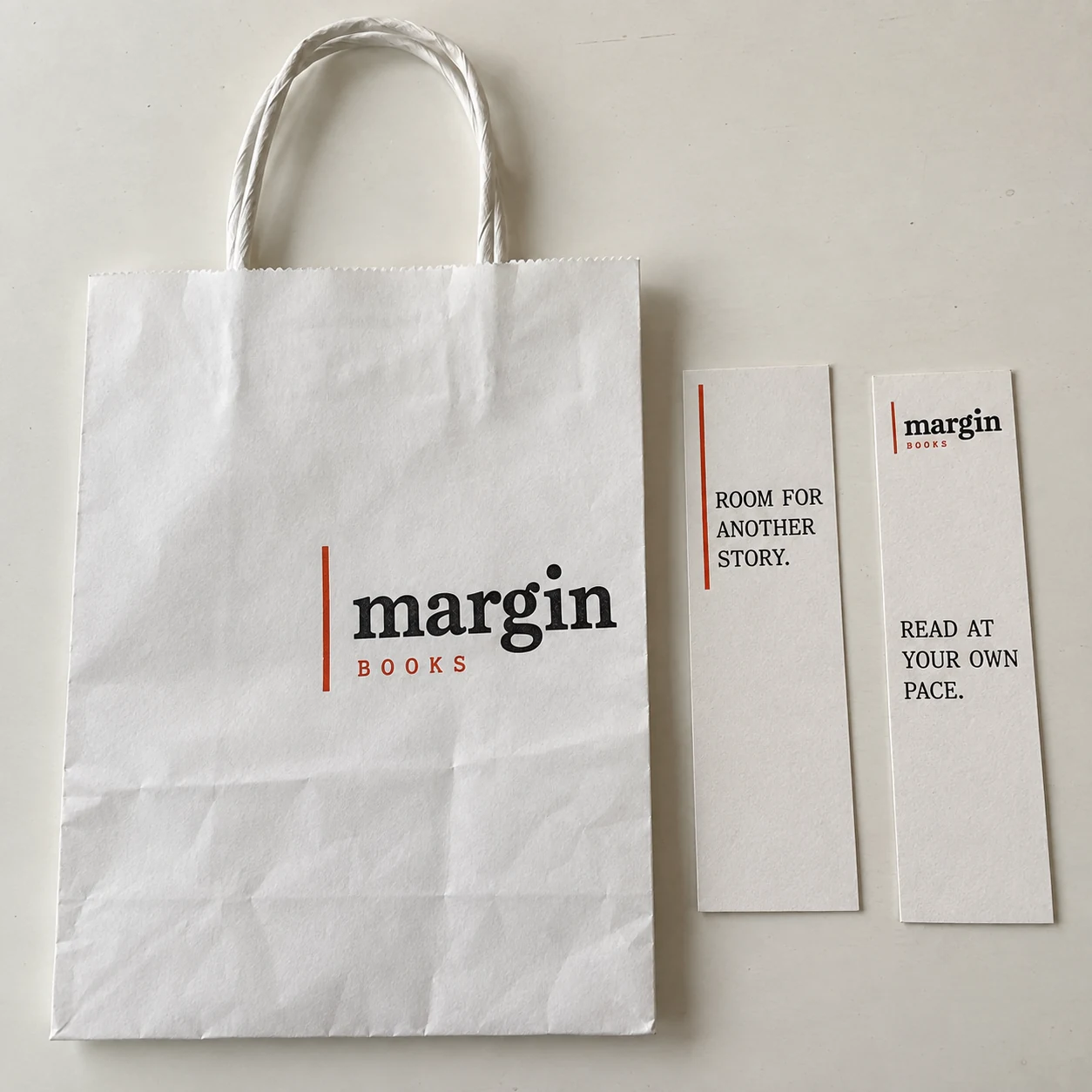 Margin Books: Shopping bag and bookmarks